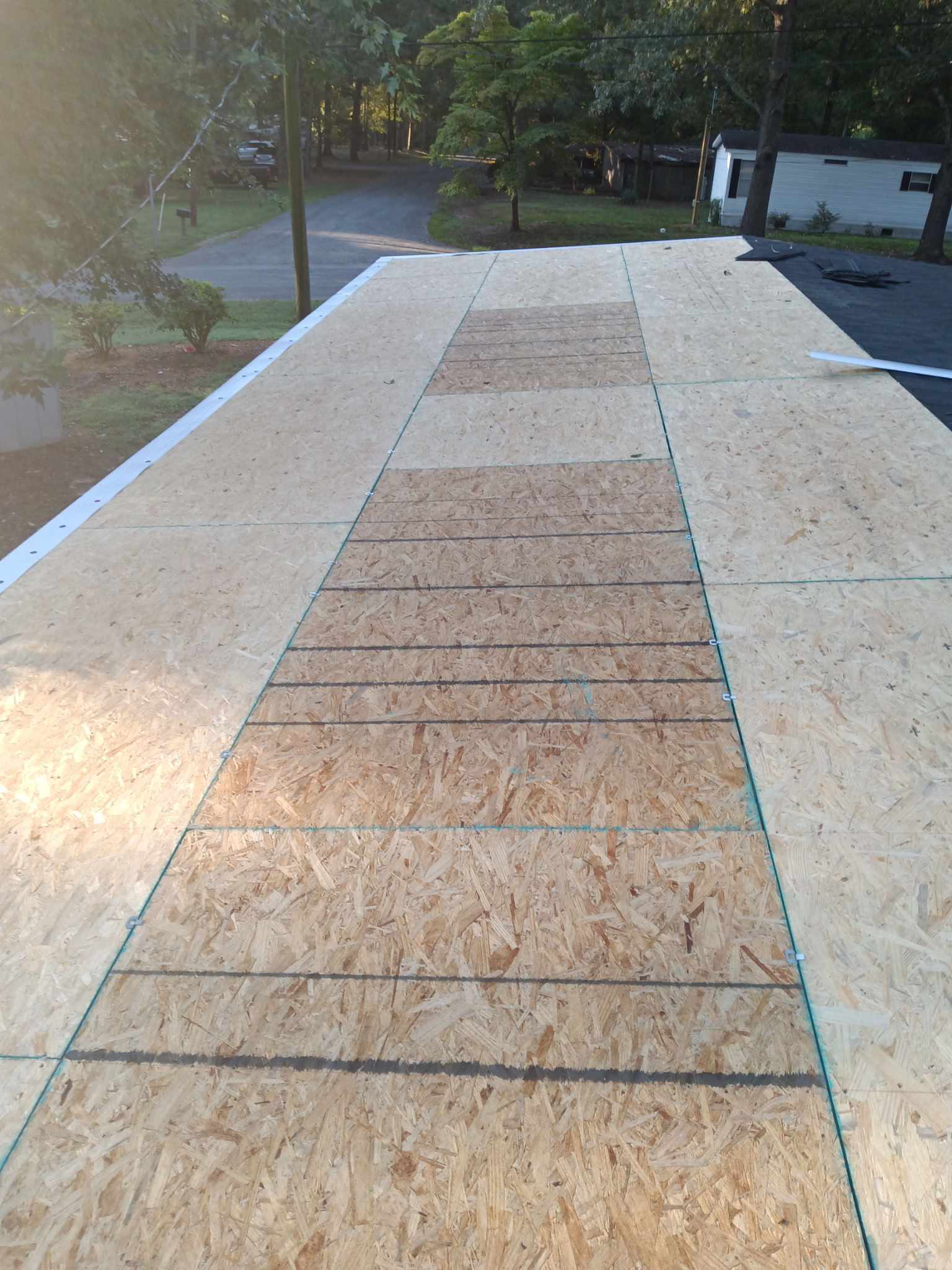 Bare OSB deck after tear-off — Charlotte NC